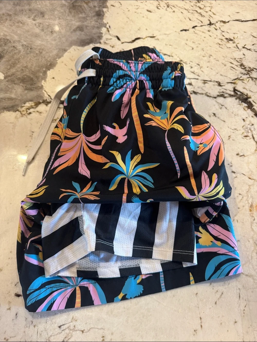 chubbies Black Swim Trunks with Pink, Blue & Yellow Tropical Palms